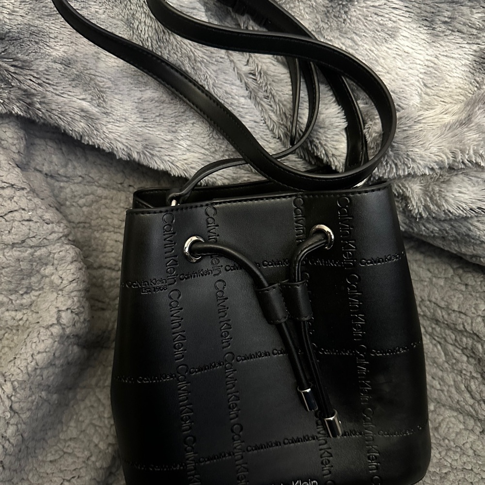 Calvin Klein Black Leather Shoulder Bag with Drawstring Closure
